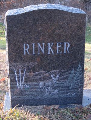gravestone with deer
